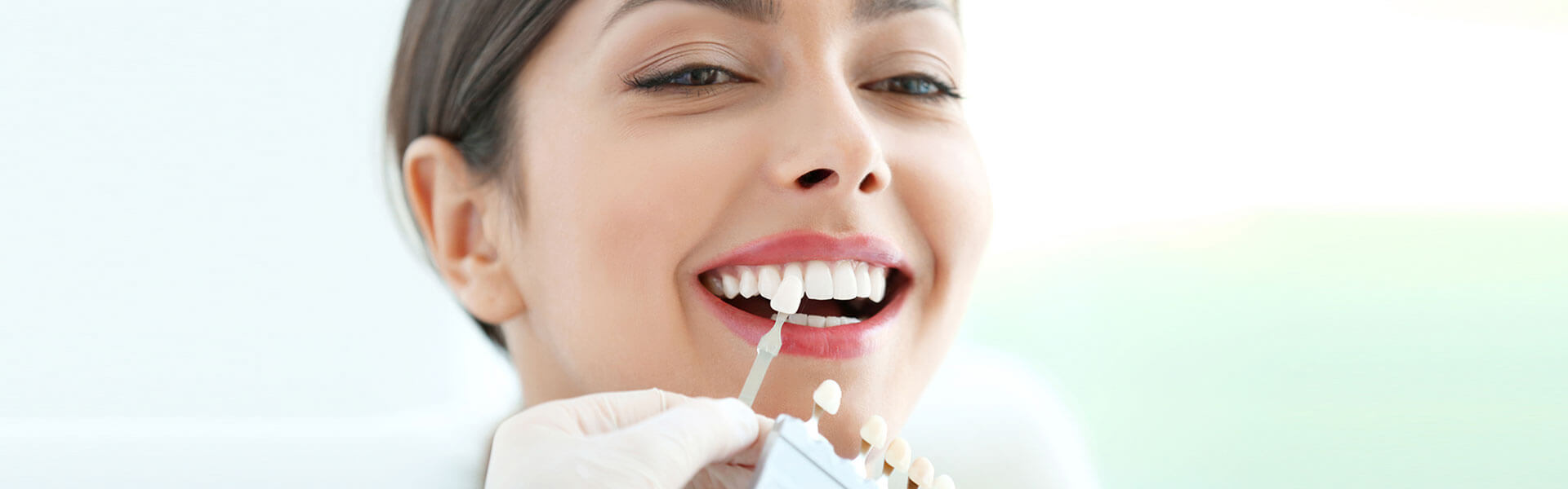 A girl having dental veneers Treatment at b & G Dentistry